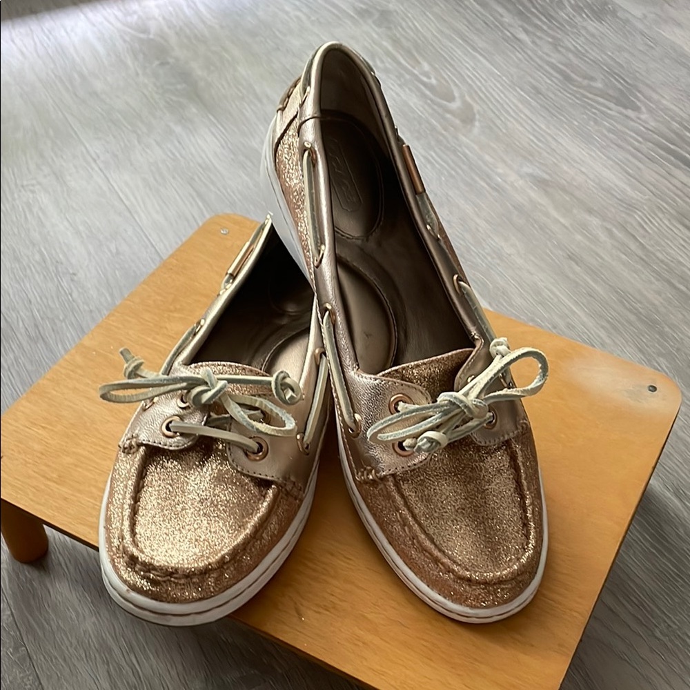Coach Gold Flats with Moccasin Stitching